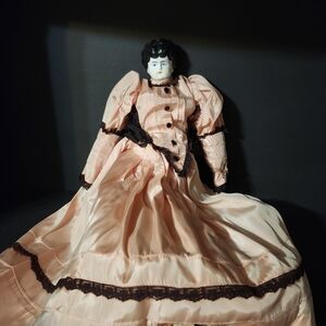 Vintage Porcelain Doll in Pink Dress